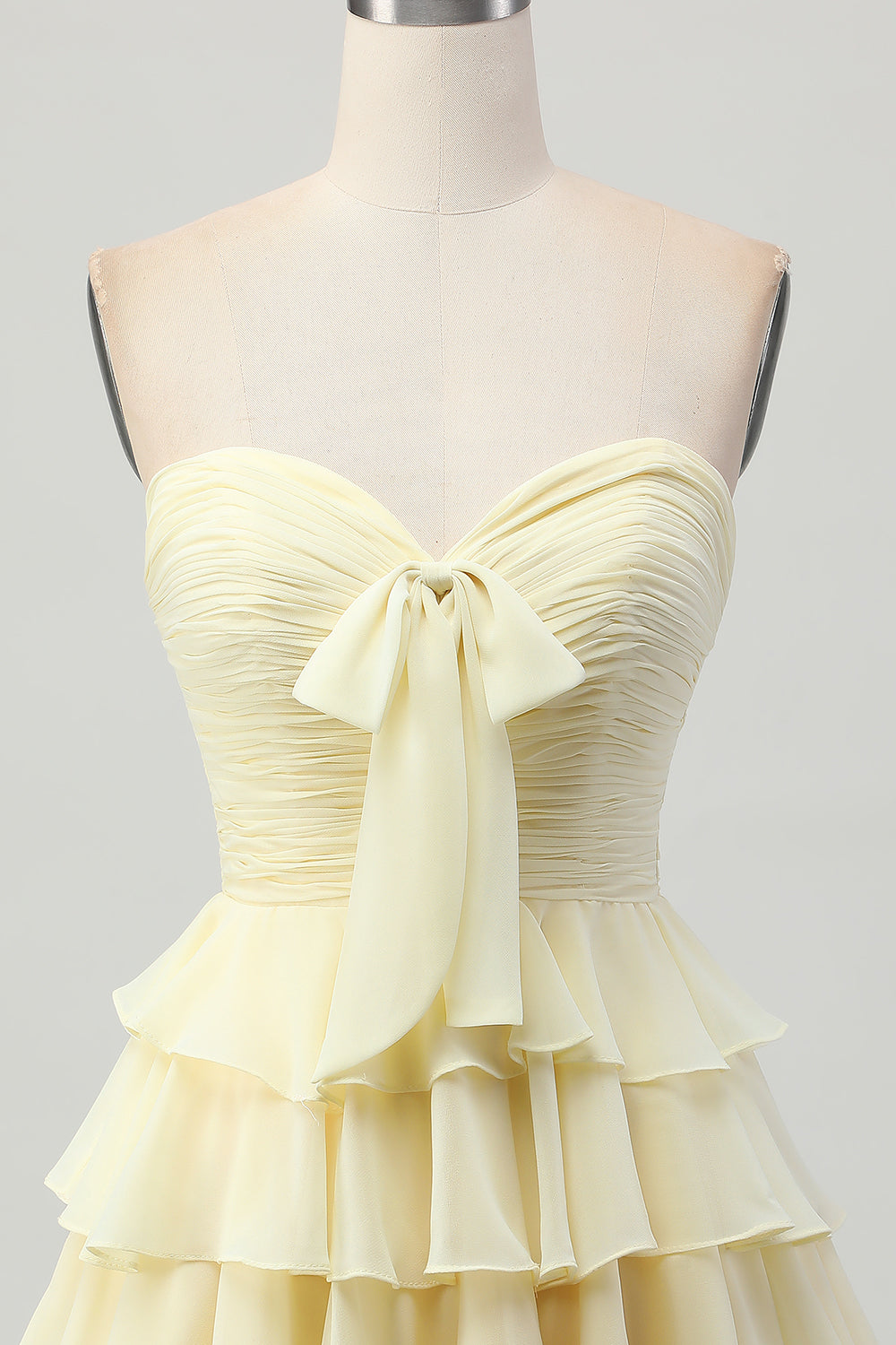 Short Light Yellow Sweetheart Ruffled A Line Tiered Homecoming Dress with Bow